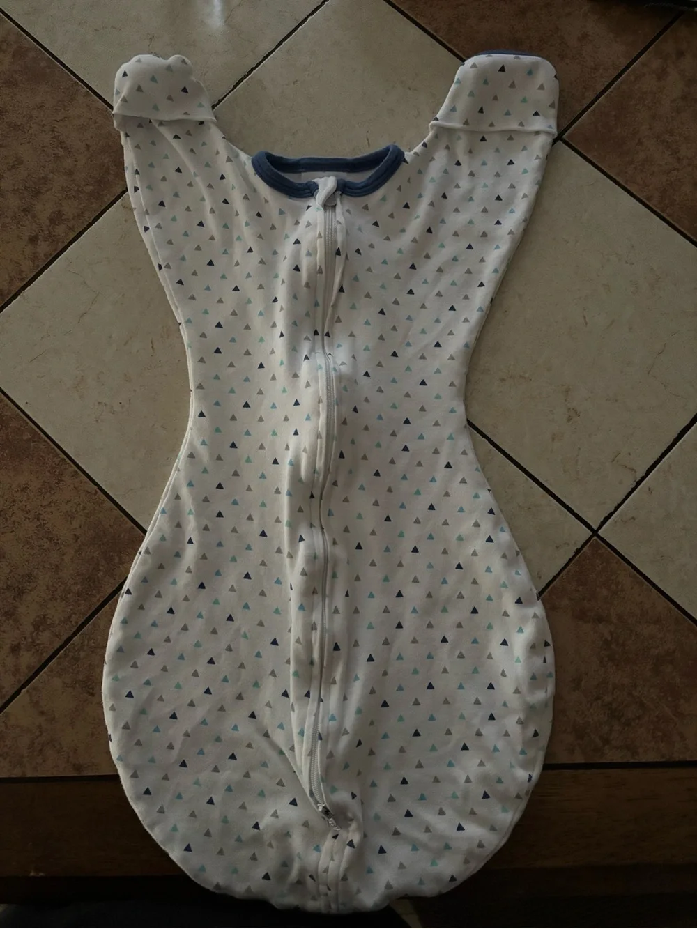 Swaddle Designs transitional sleep sack with blue trim and triangle print